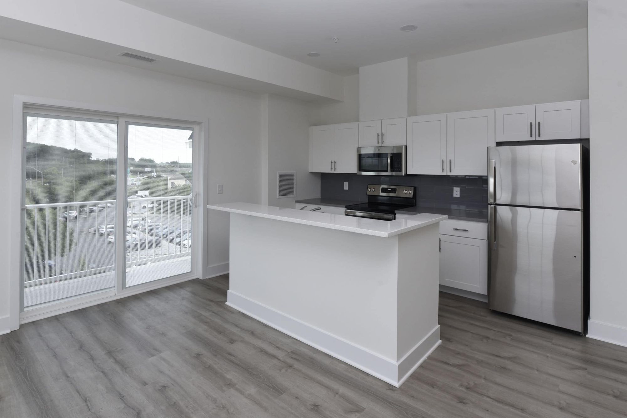 Kitchen and balcony in a Bay Manor apartment
